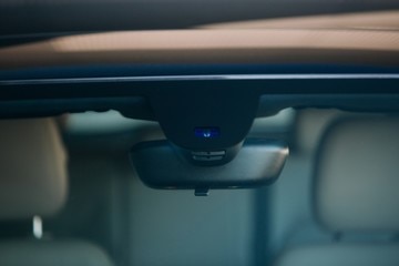 Rain and Light Sensors Typically Located Behind the Rearview Mirror.